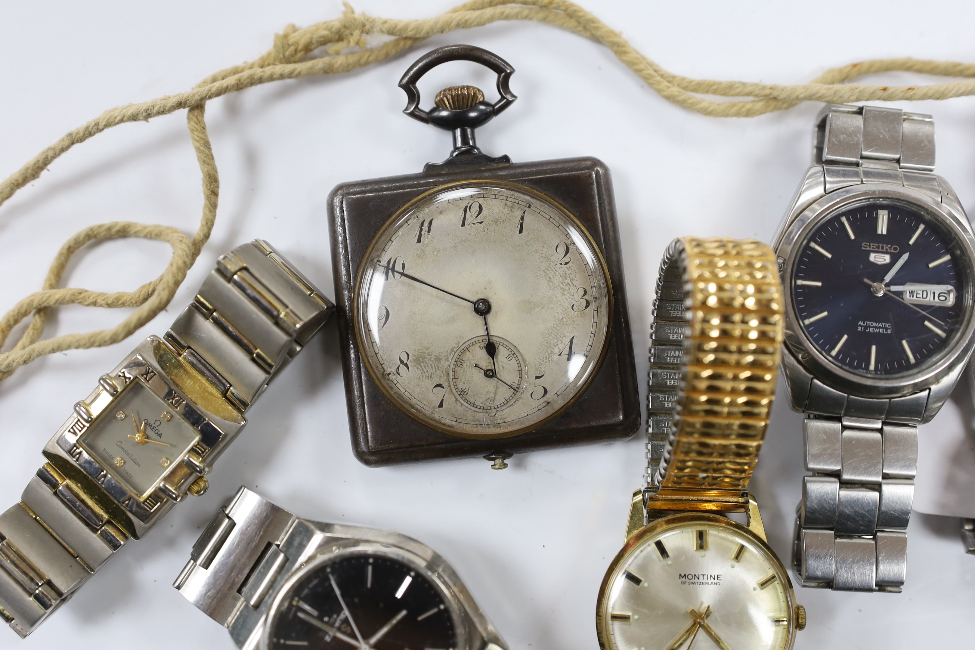 Six assorted gentleman's wrist watches including a Seiko Diashock automatic, two other Seiko watches and a sterling Rotary watch, together with a gun metal travelling timepiece and a 'Yachtsman' stop watch.